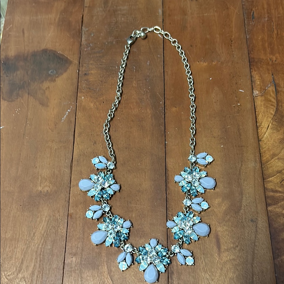 Blue And Gold Statement Necklace With Floral Clusters